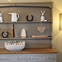 dresser with ceramic ornaments at Stables Carrog